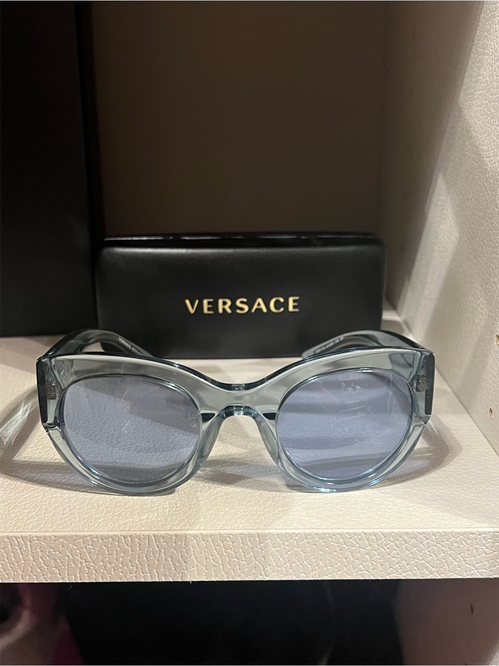 Versace Women’s Translucent Light Blue Round Sunglasses